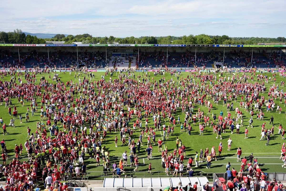 A sea of red descends on to the pitch after the game. Picture :Noel Sweeney A sea of red descends on to the pitch after the game. Picture :Noel Sweeney
