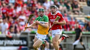 <p>Eoin Downey of Cork puts pressure on Offaly's Ter Guinan during Sunday's All-Ireland SHC quarter-final at FBD Semple Stadium. Picture: Paul Phelan/Sportsfile</p>