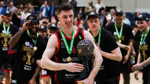 <p>Ballincollig captain Adrian O'Sullivan leads the celebrations after the game</p>