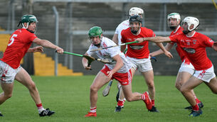 <p> Seandún's Luke Callinan is tackled by Imokilly's Ciaran O'Brien, Mike Kelly and Niall Motherway during the 2021 Co-Op SuperStores  Premier SHC Divisions/Colleges final at Pairc Ui Rinn. Picture: Eddie O'Hare</p>