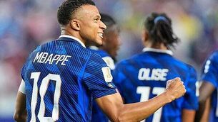 Kylian Mbappe adds two more to tally in storm-delayed win over Iraq Kylian Mbappe adds two more to tally in storm-delayed win over Iraq
