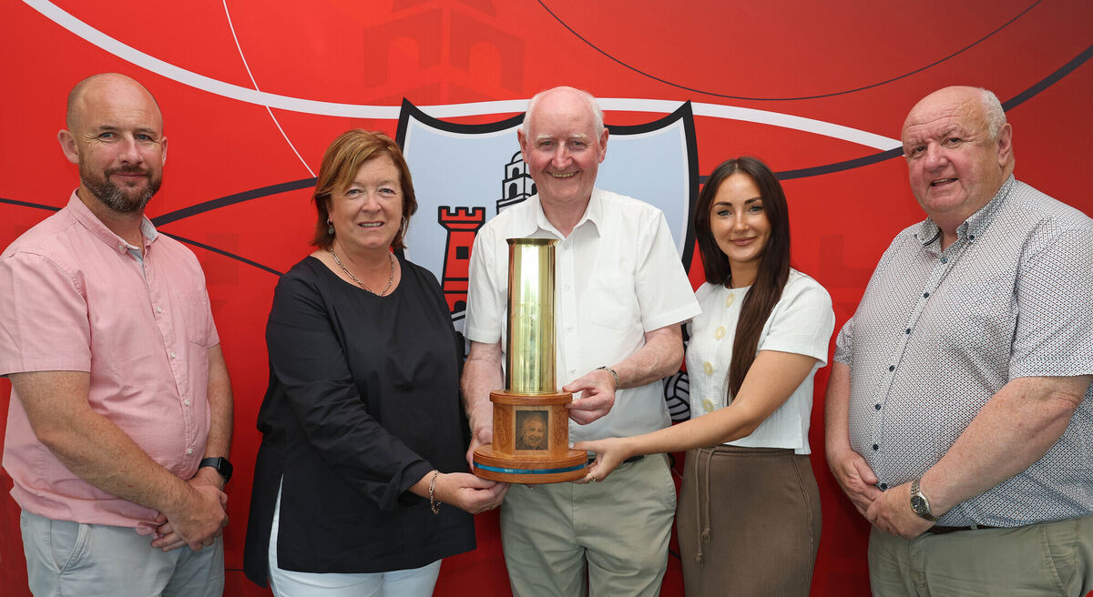 Colette and Emily Palmer, present Pat Horgan, chairperson of Cork GAA (centre) with the Paudie Palmer Memorial Trophy, also included are Kevin O'Donovan, CEO/Secretary of Cork GAA and Noel O'Callaghan, vice-chairperson of Cork GAA. Picture: Jim Coughlan Colette and Emily Palmer, present Pat Horgan, chairperson of Cork GAA (centre) with the Paudie Palmer Memorial Trophy, also included are Kevin O'Donovan, CEO/Secretary of Cork GAA and Noel O'Callaghan, vice-chairperson of Cork GAA. Picture: Jim Coughlan