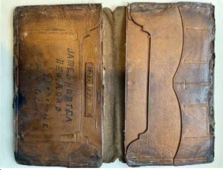James Hunter's old wallet, still treasured by his son Patsy. A letter from him to his father was left inside it. James Hunter's old wallet, still treasured by his son Patsy. A letter from him to his father was left inside it.