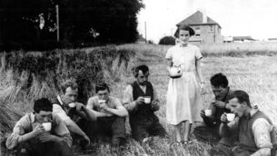 <p>Tea up time at Long’s Farm in Togher, Cork, in August, 1951. John Arnold recalls a meitheal where the tea wasn’t to anyone’s taste. </p>