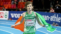 Ciaran O'Lionaird celebrates taking bronze in the Men's 3000m Final 2/3/2013