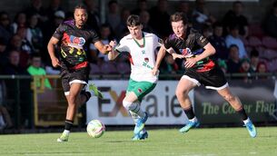<p>Cillian Murphy, Cork City, Jason Oyenuga and Steven Healy, Treaty United.</p>