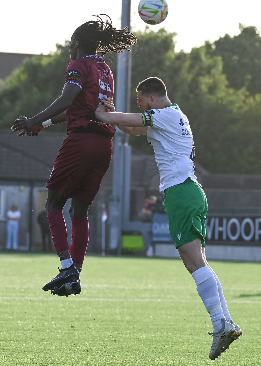  Cobh Ramblers' Wilson Waweru wins the header ahead of Kerry's Kilian Cantwell during their SSE Airtricity League Division 1 clash at St Colman's Park. Picture: David Keane.