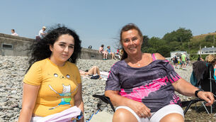 <p> MARKING: XX: Liz Dunphy; Fountainstown, Cork, Ireland. 25th June, 2026. Eileen Woods and Laila Dennehy enjoying the seaside on one of the hottest days of the year in Fountainstown, Co. Cork. - Picture: David Creedon</p>