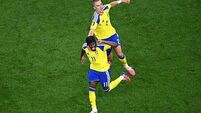 Japan and Sweden share points to book places in last 32 of World Cup