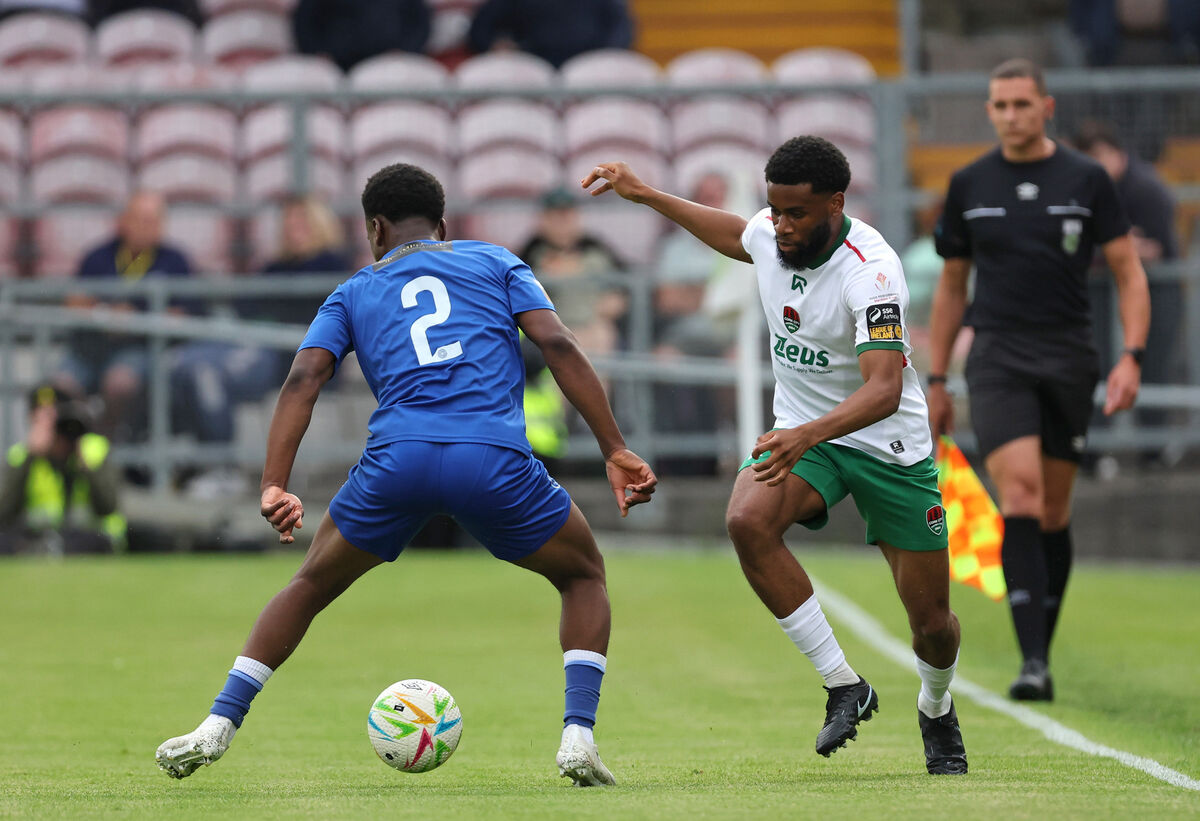 Hans Mpongo, Cork City, passes the ball through the legs of Alain Kizenga, Bray Wanderers. Picture: Jim Coughlan. Hans Mpongo, Cork City, passes the ball through the legs of Alain Kizenga, Bray Wanderers. Picture: Jim Coughlan.