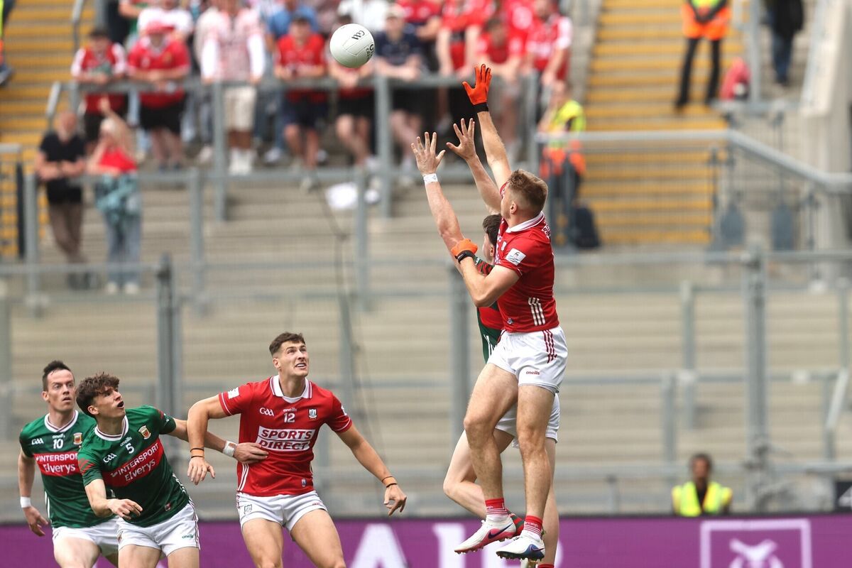 Mayo's Bob Tuohy and lan Maguire of Cork fight for the ball. Picture: Bryan Keane/INPHO Mayo's Bob Tuohy and lan Maguire of Cork fight for the ball. Picture: Bryan Keane/INPHO