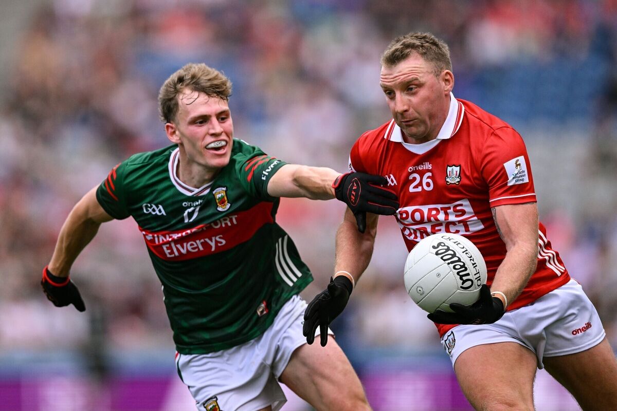 Brian Hurley of Cork in action against Diarmuid Duffy of Mayo. Picture: Ramsey Cardy/Sportsfile