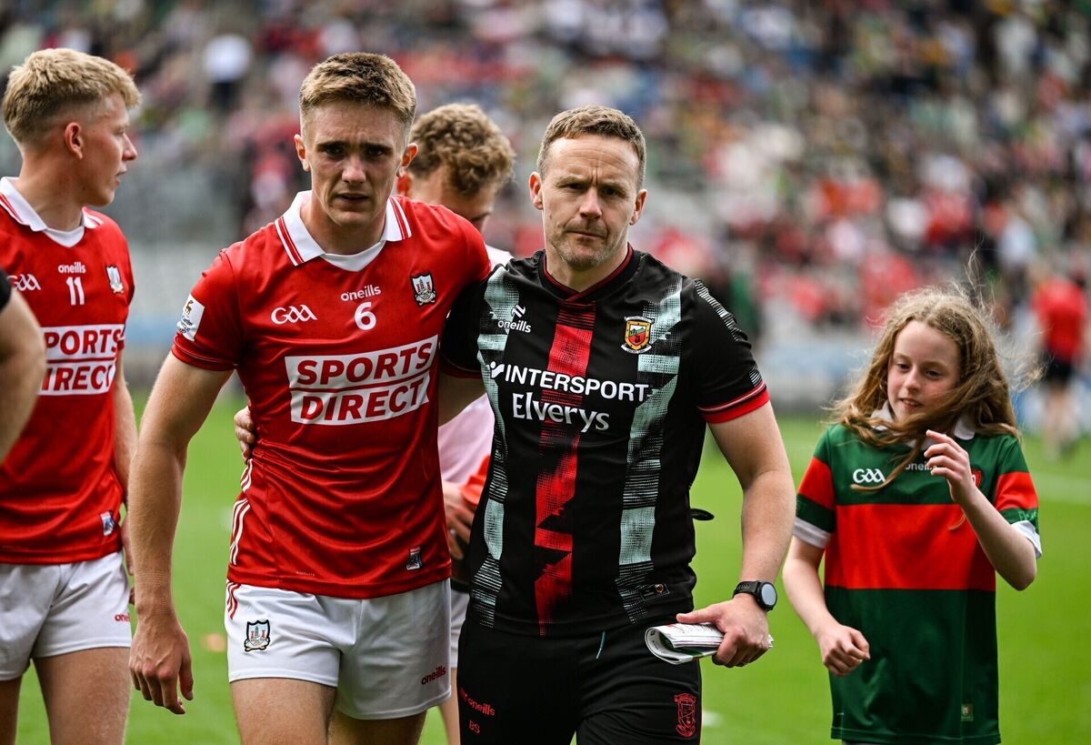 Mayo manager Andy Moran consoles Tommy Walsh of Cork. Picture: Ray McManus/Sportsfile