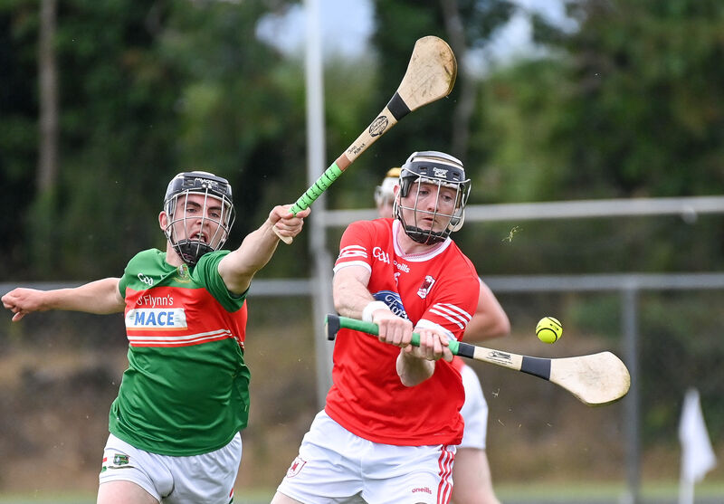  Charleville's Alan Dennehy shoots under pressure from Fr O'Neill's John Millerick. Picture: David Keane.