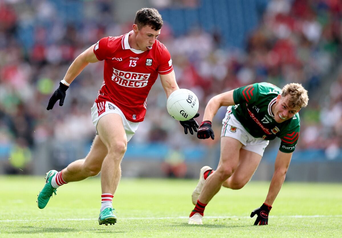 Cork’s Mark Cronin and Diarmuid Duffy of Mayo in action. Picture: James Crombie/INPHO