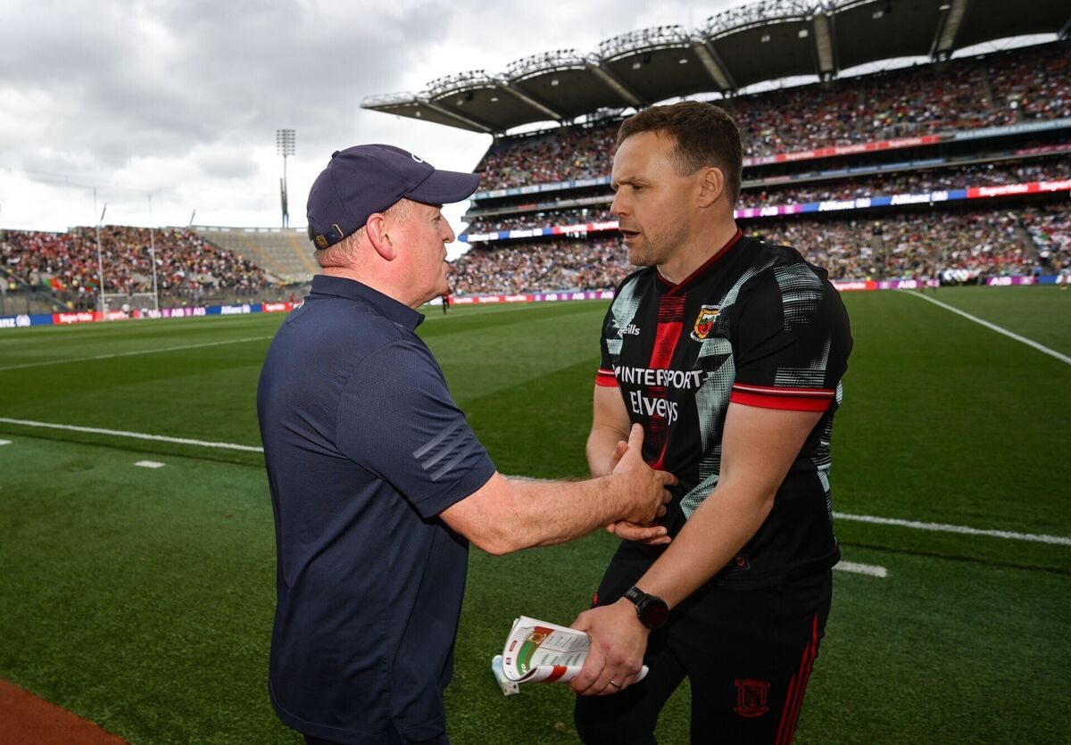 Mayo manager Andy Moran, right, shakes hands with Cork manager John Cleary after the game. Picture: Ramsey Cardy/Sportsfile