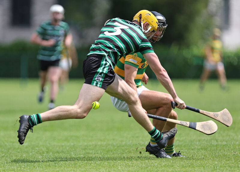 Blackrock's Tadgh Deasy battles for possession with Daniel Harte of Douglas. Picture: Jim Coughlan