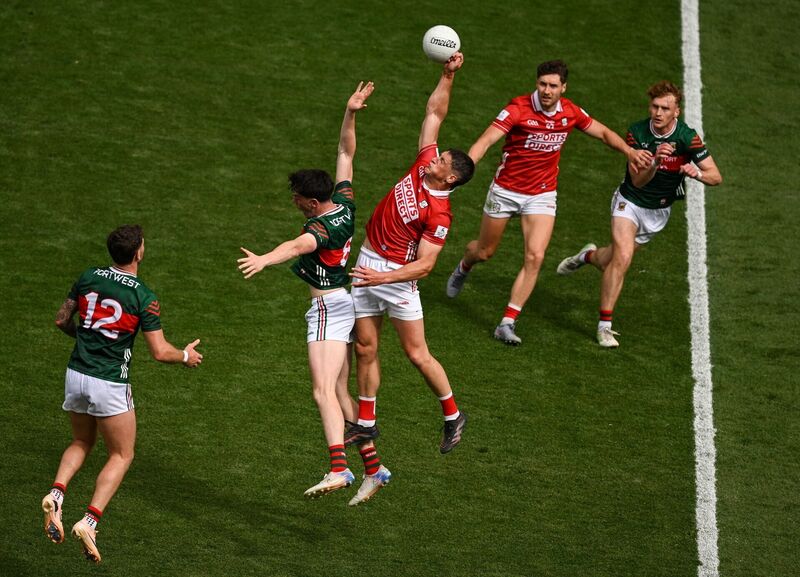 Colm O'Callaghan of Cork in action against Bob Touhy of Mayo. Picture: Sam Barnes/Sportsfile Colm O'Callaghan of Cork in action against Bob Touhy of Mayo. Picture: Sam Barnes/Sportsfile