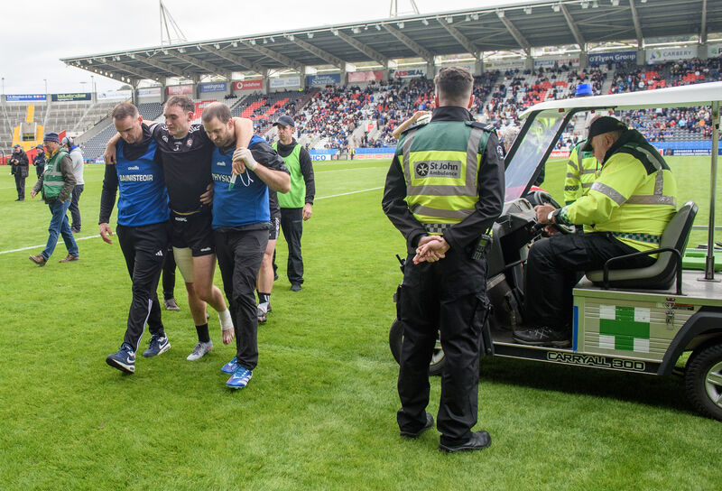  Eoin Moloney, Midleton is helped from the pitch after their Co-Op Superstores Premier SHC semi-final at SuperValu Páirc Uí Chaoimh. Picture Dan Linehan