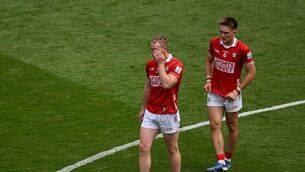 <p>Ruairí Deane and Tommy Walsh left dejected after losing to Mayo at Croke Park. Picture: Sam Barnes/Sportsfile</p>