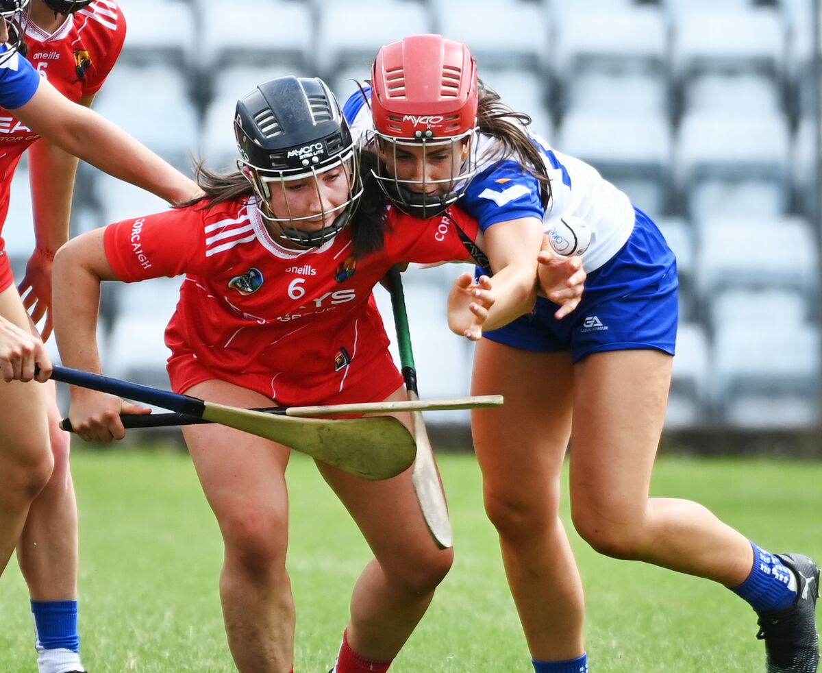 Cork's Meabh Murphy and Waterford's Beth Carton tussle for the sliotar. Picture: Eddie O'Hare