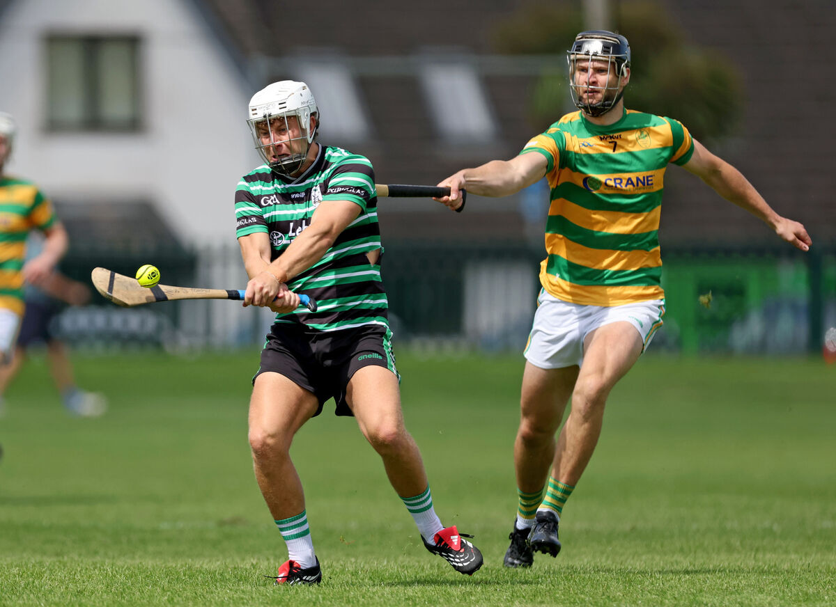  Tadgh Deasy of Blackrock attempts to hook Douglas's Andy O'Connell during Sunday's RedFM Hurling League Division 1 game at Church Road. Picture: Jim Coughlan