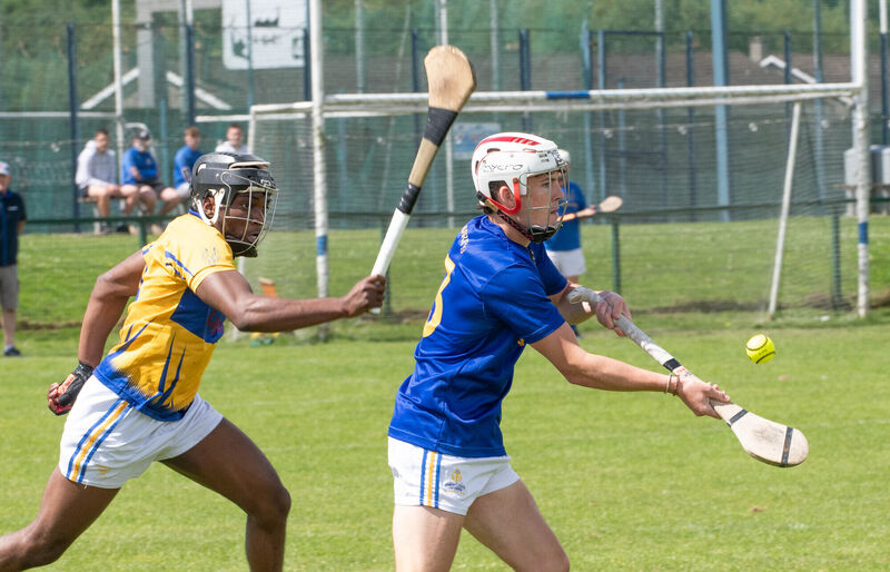 St Finbarr's John Wiggington Barrett controls the sliotar ahead of Carrigtwohill's David Joseph. Picture: Howard Crowdy