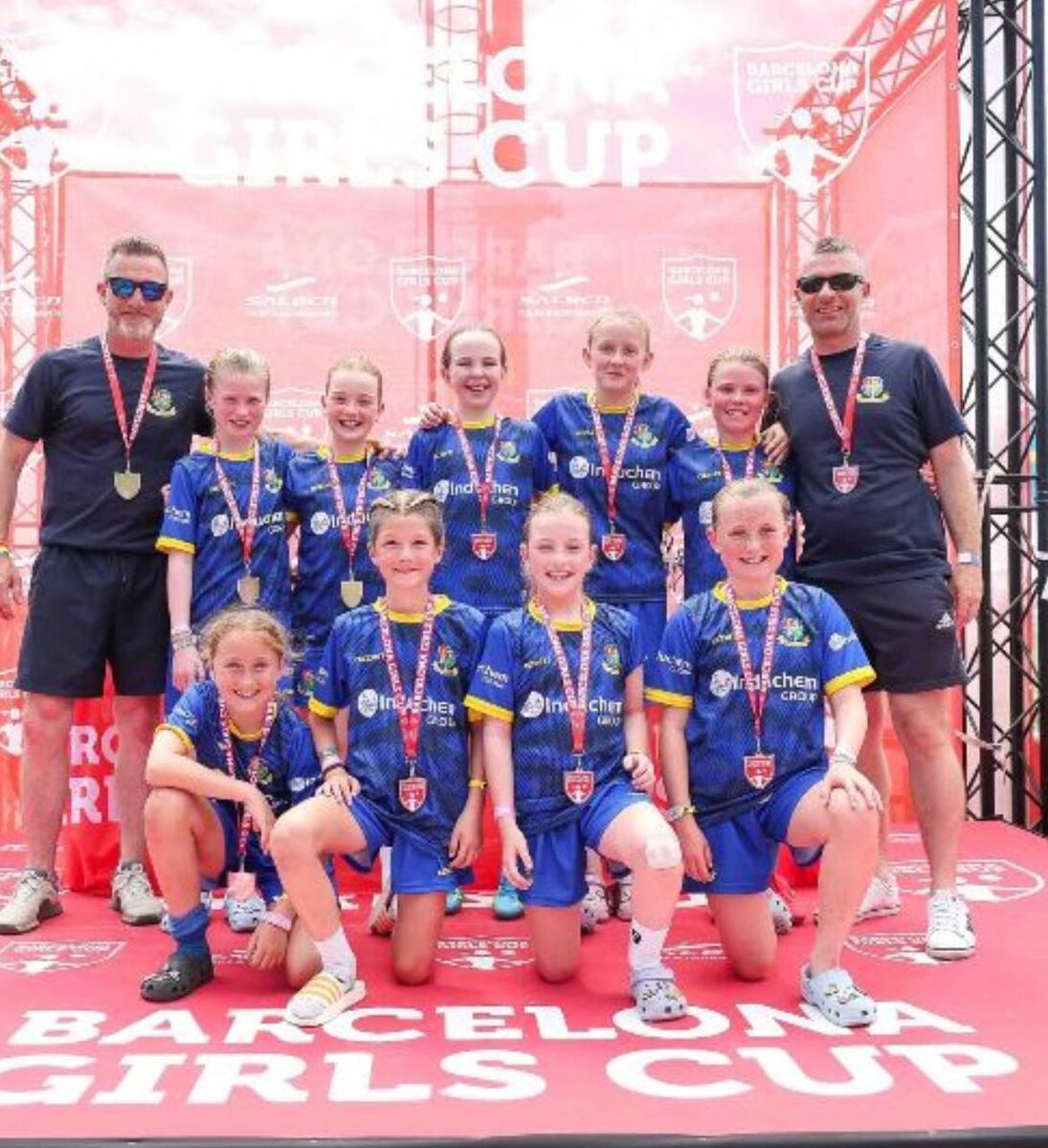 The victorious Carrigaline U11 team with coaches Alan Hennessy and Stephen Mangan at the Barcelona Cup. The victorious Carrigaline U11 team with coaches Alan Hennessy and Stephen Mangan at the Barcelona Cup.