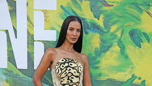 Maya Jama and Novak Djokovic appear on stage at Bad Bunny’s London show
