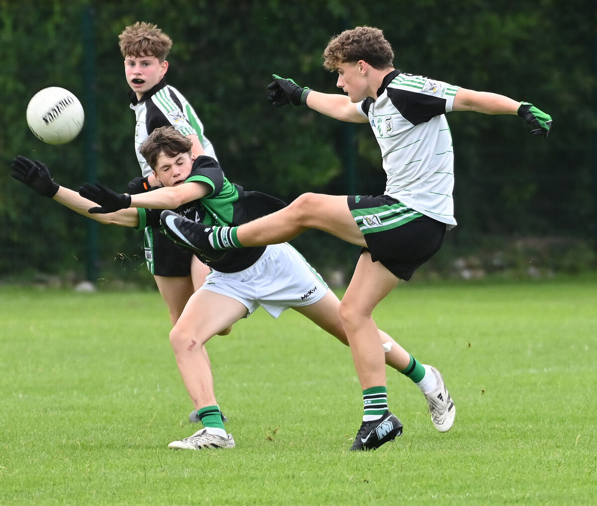 Douglas' Cian Lehane shoots from Nemo Rangers' James McCarthy during the Rebel Óg under 16 Premier 1 football league final at Shanbally. Picture:Eddie O'Hare