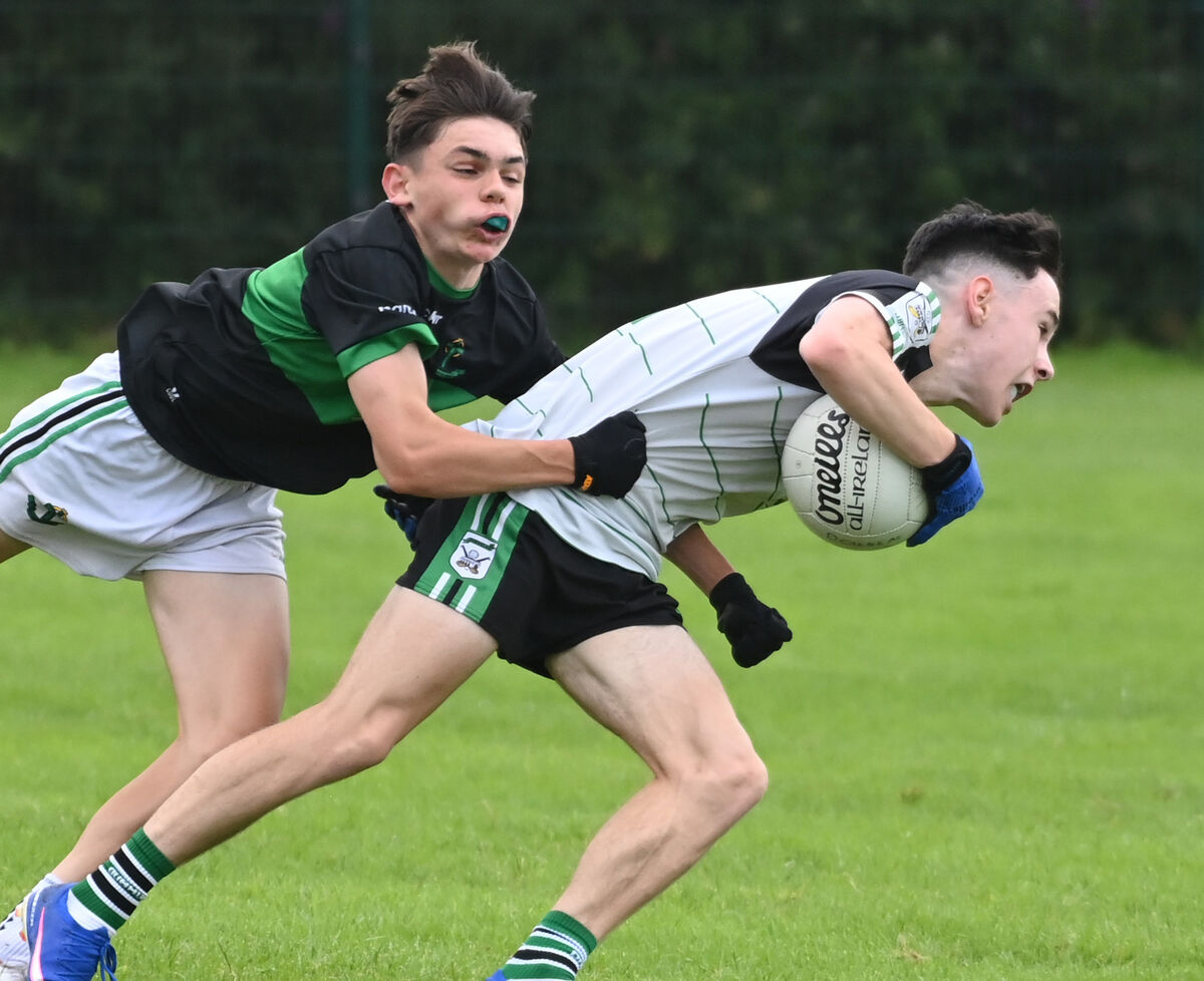 Douglas' Conor Crowley is tackled by Nemo Rangers' Mathew O'Leary during the Rebel Óg under 16 Premier 1 football league final at Shanbally. Picture:Eddie O'Hare