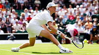 Jannik Sinner bloodied as he survives scare in fierce five-set Wimbledon opener