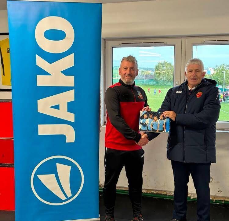 MSL chairman John Lyne presents the Jako team kit voucher to Ringmahon Rangers secretary Alan Cooper for winning the Beamish Stout Junior Premier Division. MSL chairman John Lyne presents the Jako team kit voucher to Ringmahon Rangers secretary Alan Cooper for winning the Beamish Stout Junior Premier Division.