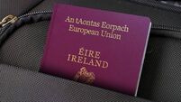 Close up of Ireland Passport in Black Suitcase Pocket