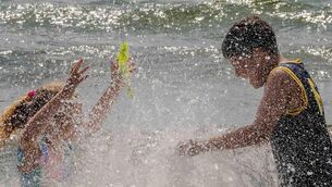 <p>Children keep cool in the sea at the Warren Beach in Rosscarbery during last week’s heatwave. <span class="contextmenu emphasis CaptionCredit">Picture: Andy Gibson</span>
            </p>
