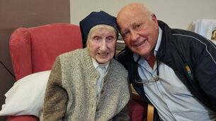 <p>Sr Colette Hickey and John Arnold in December, 2024. She died last week aged 108</p>