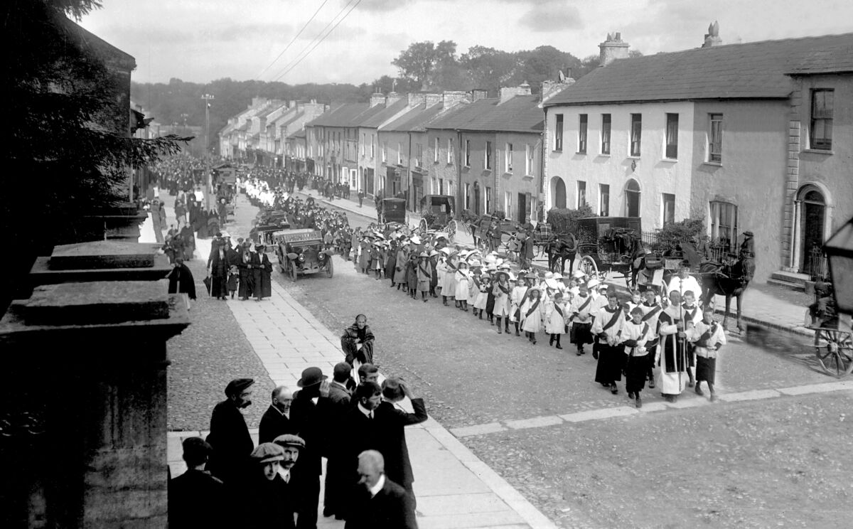 The funeral of Canon Sheehan passes through Main Street, Doneraile, in 1913. Today’s Throwback Thursday details some of the shops in the town, and reflects on the since-abandoned practice of ‘churching’ The funeral of Canon Sheehan passes through Main Street, Doneraile, in 1913. Today’s Throwback Thursday details some of the shops in the town, and reflects on the since-abandoned practice of ‘churching’