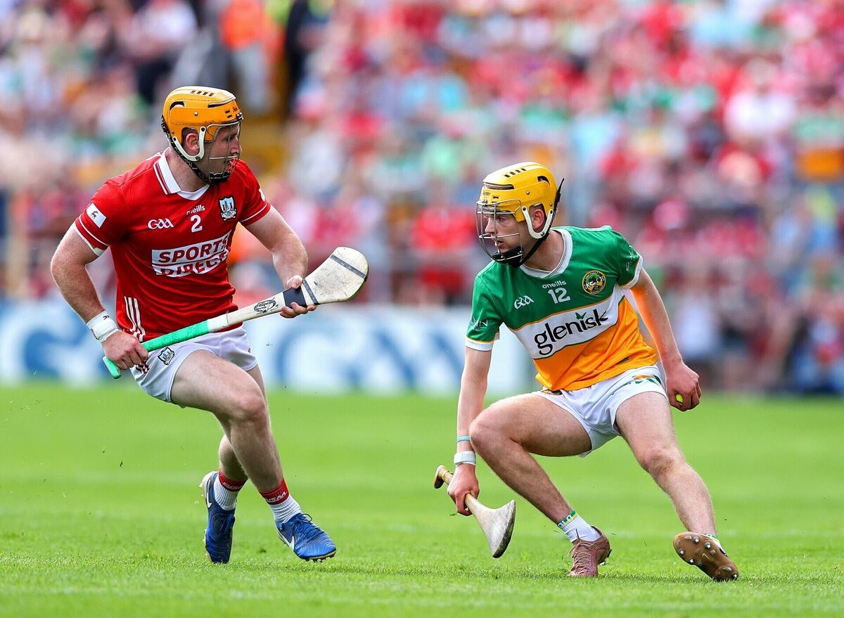 Cork's Niall O'Leary with Dan Bourke of Offaly. Picture: Tom O'Hanlon/INPHO