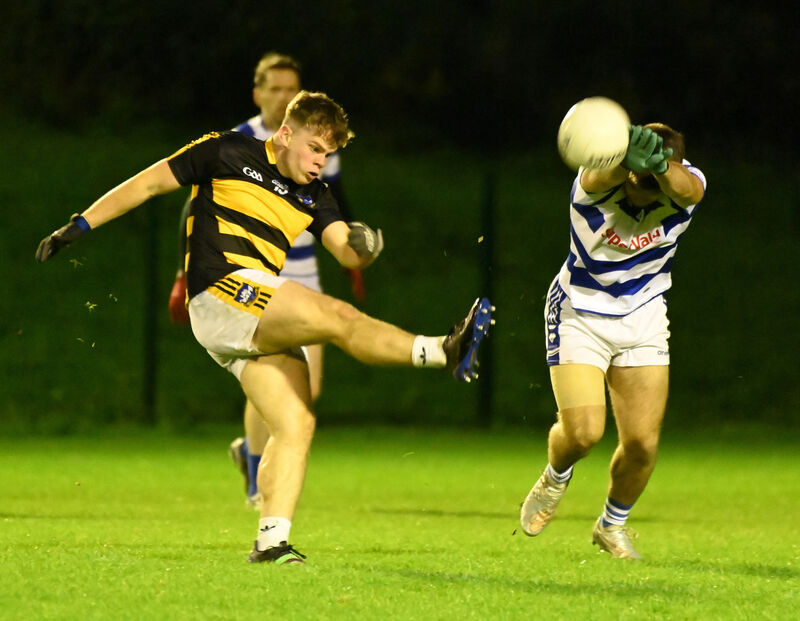 Canovee's Jack Kelleher shoots from Inniscarra's Jack O'Sullivan. Picture: Eddie O'Hare Canovee's Jack Kelleher shoots from Inniscarra's Jack O'Sullivan. Picture: Eddie O'Hare