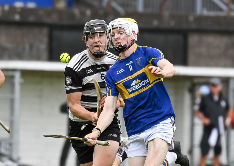 Carrigtwohill's Matthew Barrett and Midleton's Tadhg O'Leary Hayes in a race for possession during their SHL clash in Midleton. Picture: David Keane. Carrigtwohill's Matthew Barrett and Midleton's Tadhg O'Leary Hayes in a race for possession during their SHL clash in Midleton. Picture: David Keane.