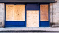 Boarded up shop