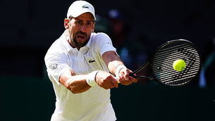 Novak Djokovic recovers from poor third set to continue Wimbledon title bid Novak Djokovic recovers from poor third set to continue Wimbledon title bid