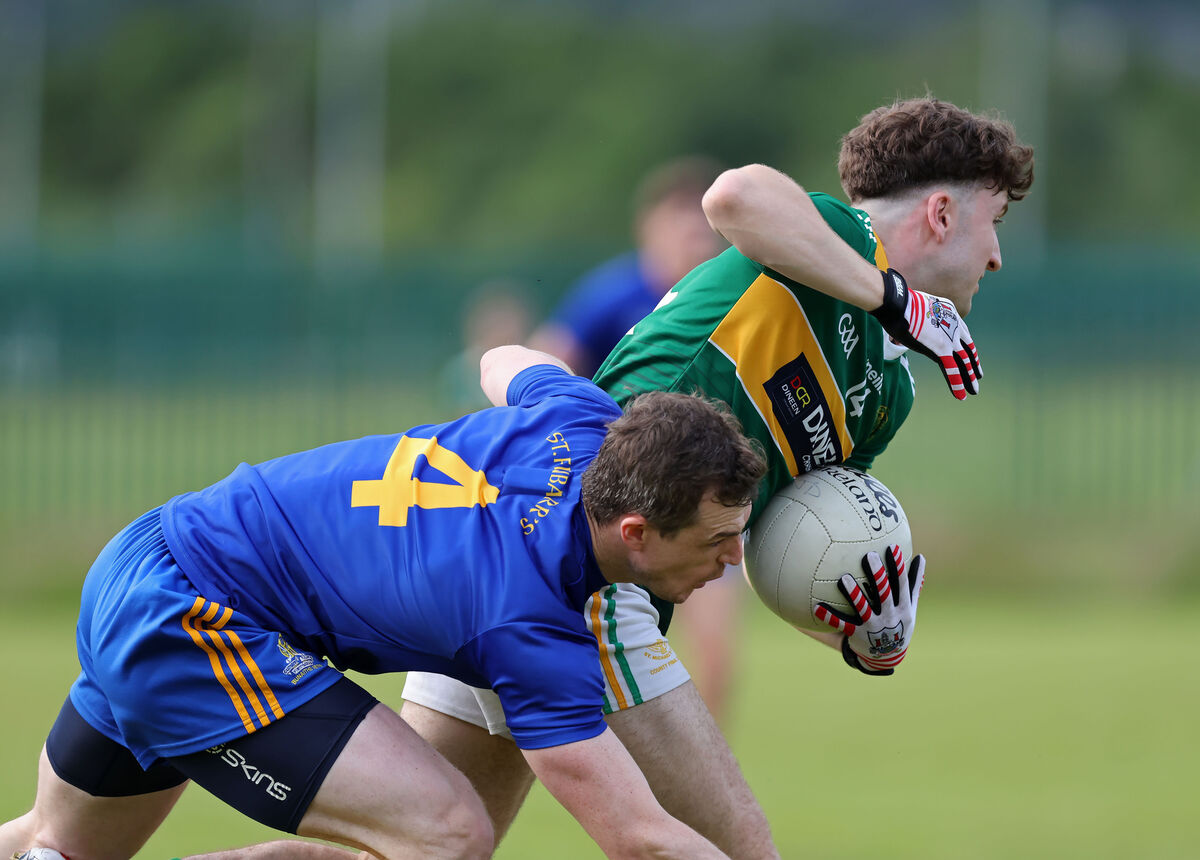 Luke O'Herlihy of St Michael's moves away from Alan O'Connor of St Finbarr's. Picture: Jim Coughlan Luke O'Herlihy of St Michael's moves away from Alan O'Connor of St Finbarr's. Picture: Jim Coughlan