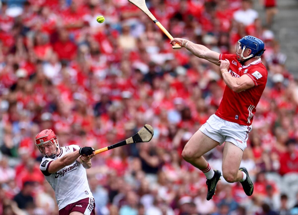 Cork's Seán O'Donoghue blocks a shot by Conor Whelan of Galway. Picture: Inpho/James Crombie