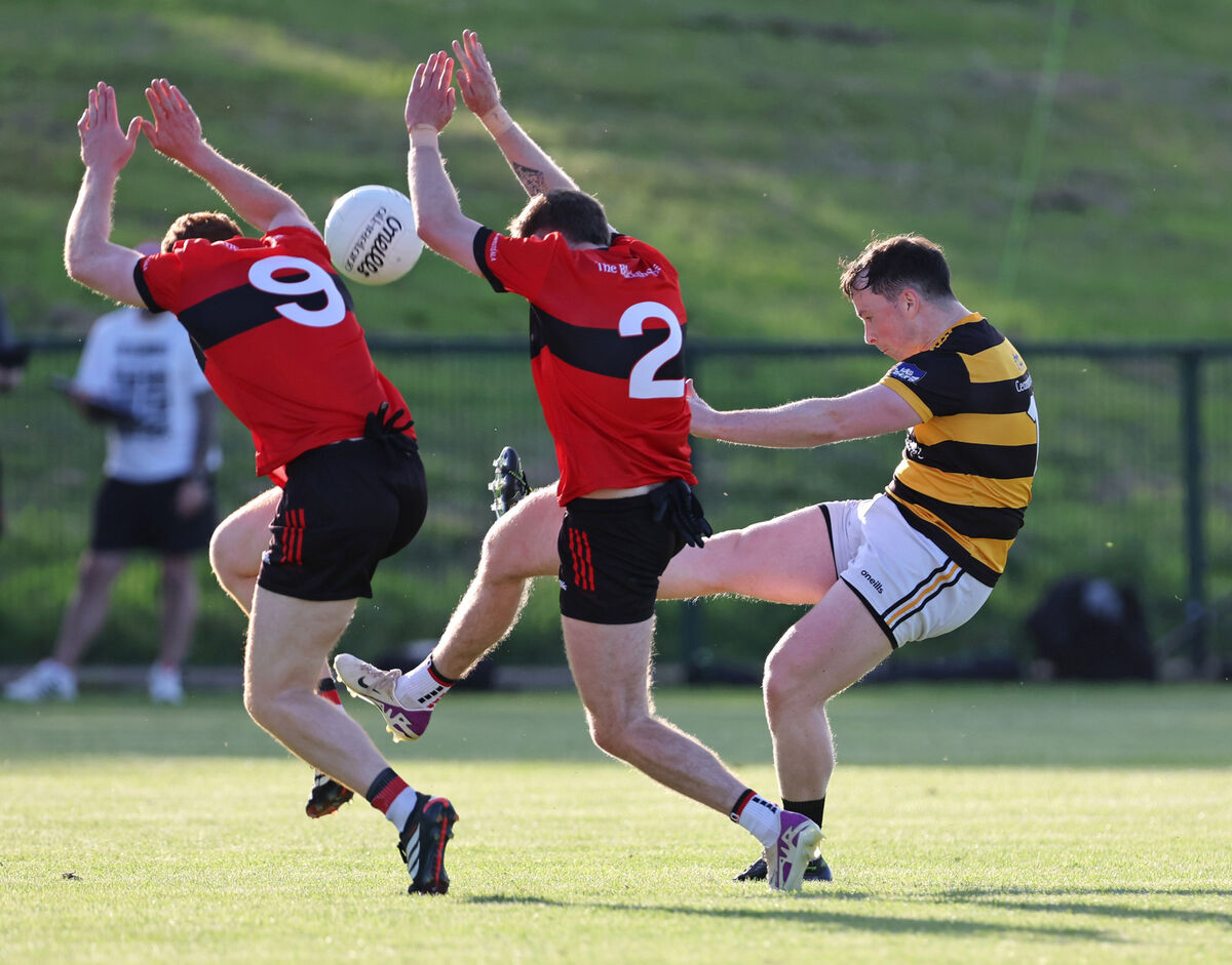 Cormac Keane-Hyland and Lorcan Finn, Mitchelstown, try to block Sean O'Connor, Canovee. Picture: Jim Coughlan. Cormac Keane-Hyland and Lorcan Finn, Mitchelstown, try to block Sean O'Connor, Canovee. Picture: Jim Coughlan.