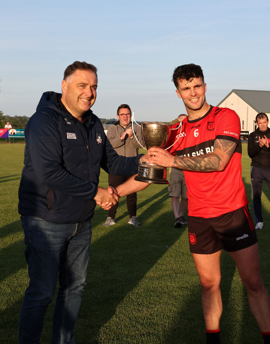 Ger O'Sullivan, Cork County Board presents the Cup to Ronan Murphy, Mitchelstown. Picture: Jim Coughlan. Ger O'Sullivan, Cork County Board presents the Cup to Ronan Murphy, Mitchelstown. Picture: Jim Coughlan.