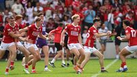 Cork players celebrate at the final whistle  5/7/2026