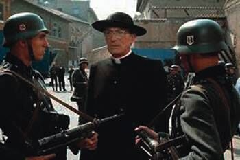 Gregory Peck in the lead role as Monsignor Hugh O’Flaherty in a scene from 'The Scarlet and The Black.' Gregory Peck in the lead role as Monsignor Hugh O’Flaherty in a scene from 'The Scarlet and The Black.'