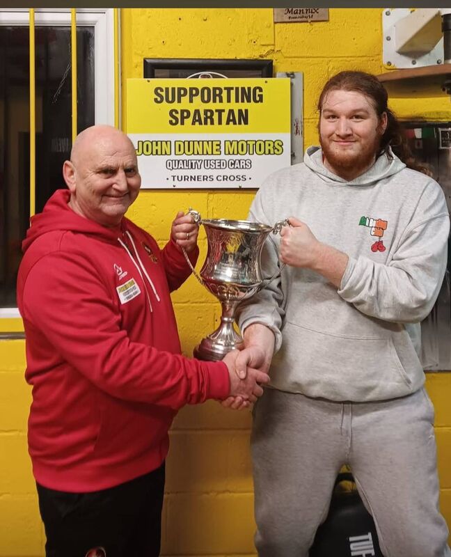 Cork Boxing: Spartan head coach Paddy McSweeney presents the Clubman of the Year to George St Leger.