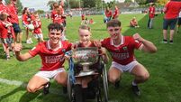 Joe Miskella and Jacob Barry celebrate with Rian Sommers  5/7/2026